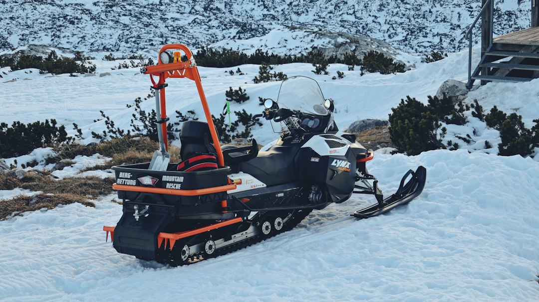 Crafting Captivating Headlines: Your awesome post title goes here a-snowmobile-parked-in-the-snow-with-a-ski-lift-attached-to-it-ktkzbtcn5s4