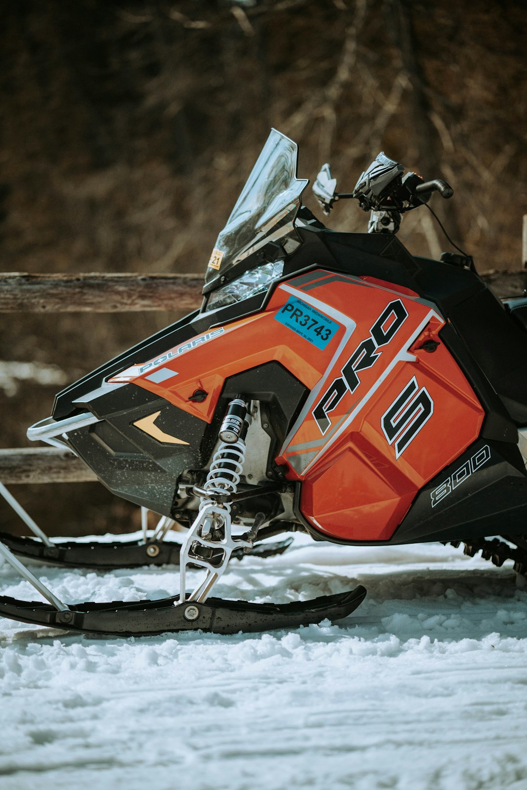 Home Red Polaris snowmobile.