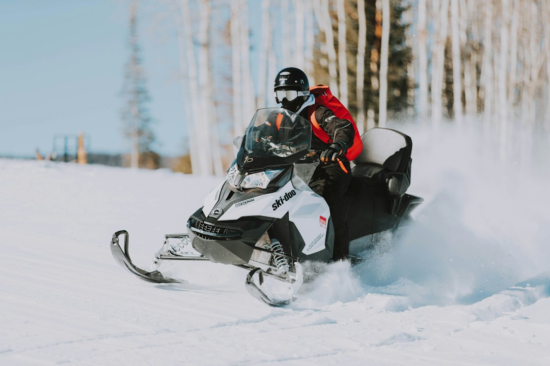 The Art of Drawing Readers In: Your attractive post title goes here snowmobile-speeding-on-snow-near-tree-lines-tbrvu6sch6c